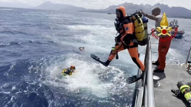 Deep seas and tight spaces impede search for 6 missing after yacht sinks off Sicily Deep seas and tight spaces impede search for 6 missing after yacht sinks off Sicily